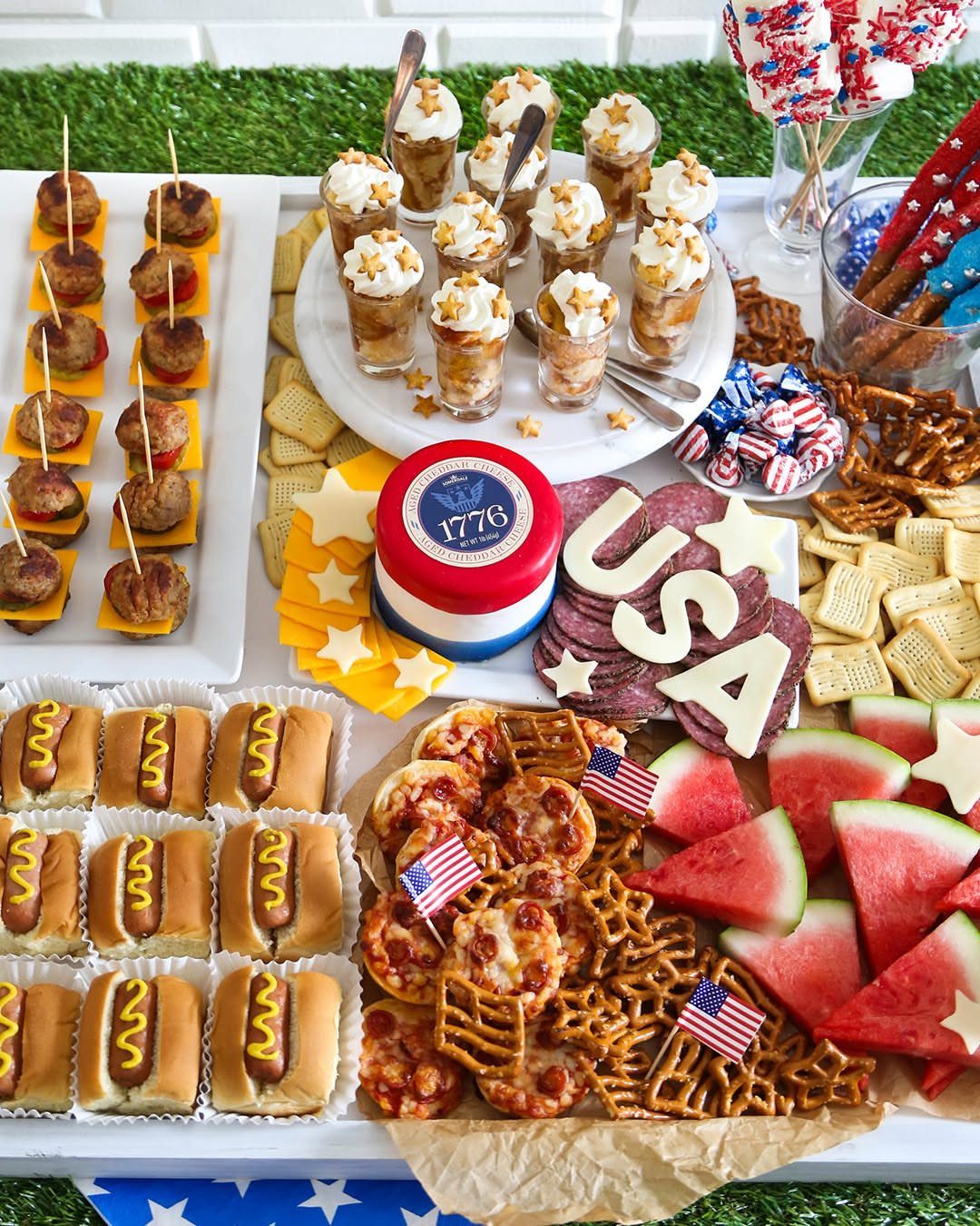 Festive 4th of July food spread with patriotic snacks and American flag accents.