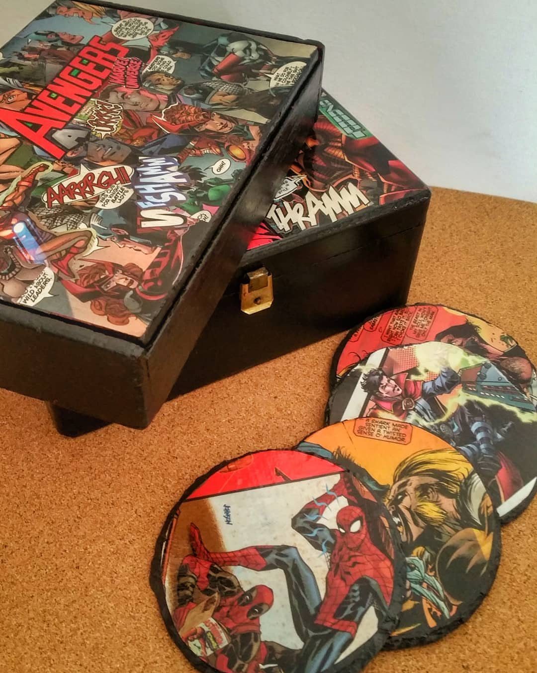 Comic book coasters and a matching storage box featuring Marvel superhero artwork.