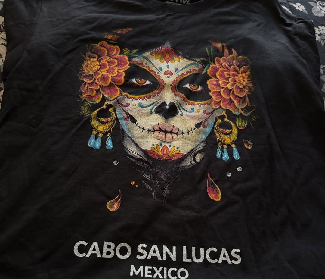 Black t-shirt with a colorful sugar skull face graphic and Mexico text.