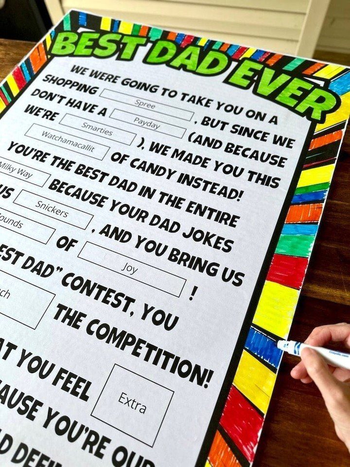 Handmade Father's Day poster with candy bars glued to it as a craft.