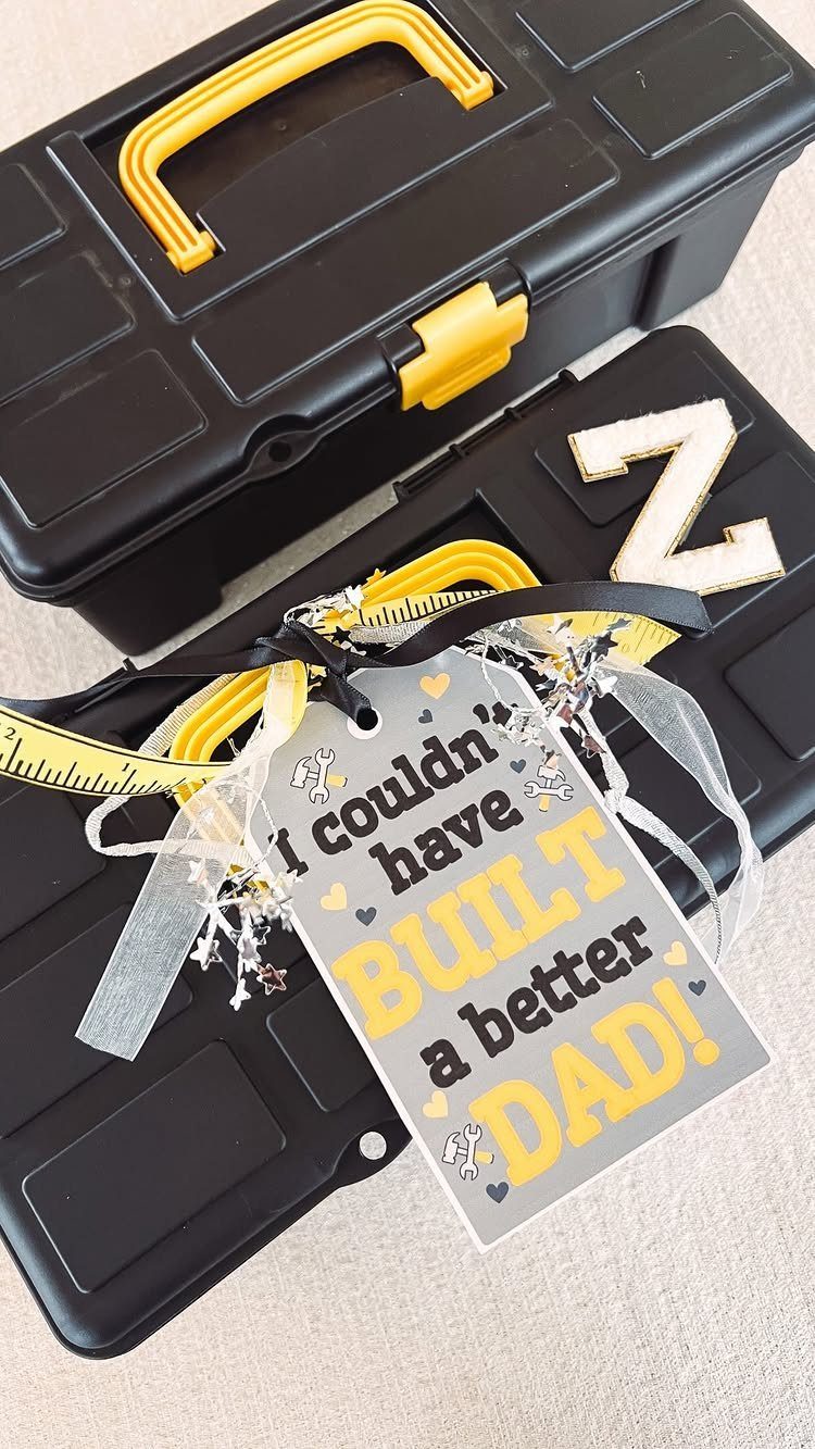 Black toolboxes with a gift tag saying I couldn't have built a better dad
