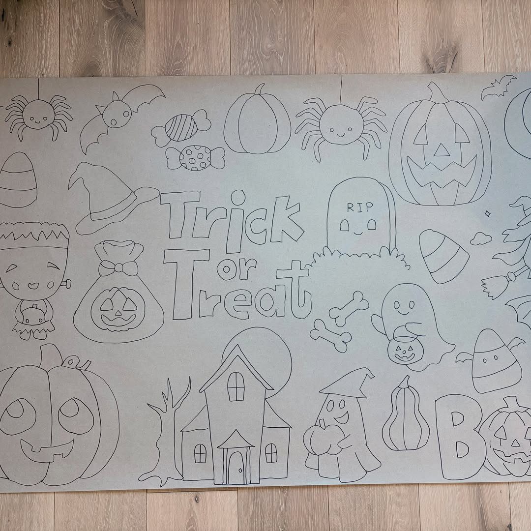 Halloween coloring page with pumpkins, ghosts, and a haunted house on grey paper.