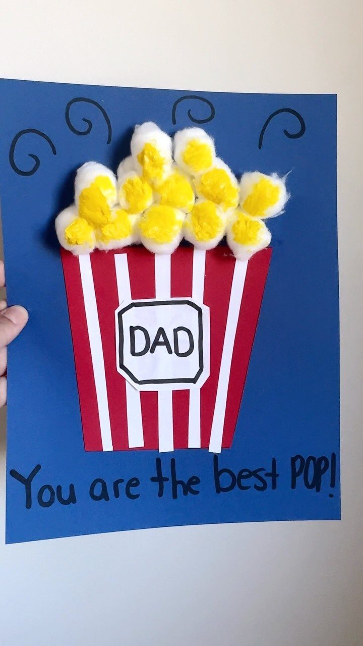 Handmade Father's Day card featuring a popcorn bucket made of paper and cotton balls.
