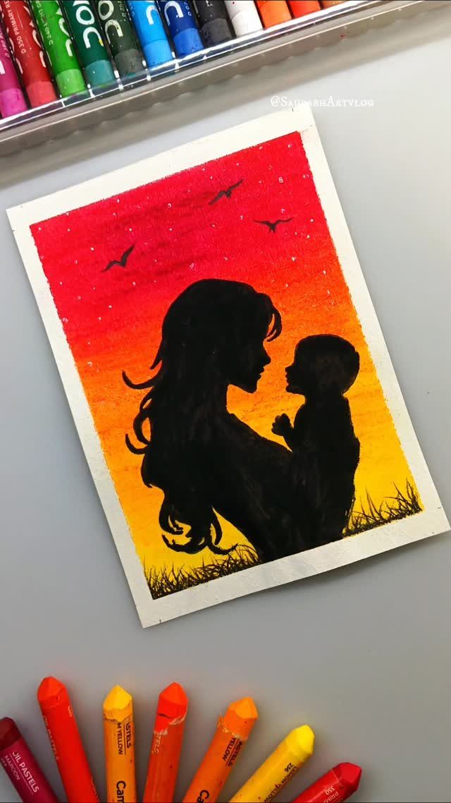 Silhouette of a mother and child against a vibrant sunset sky colored with pastels.