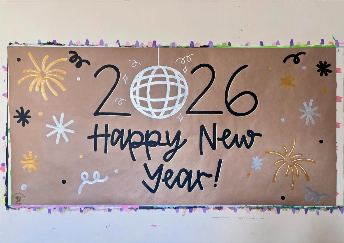 Handmade brown paper New Year's banner with 2026 and festive fireworks illustrations.