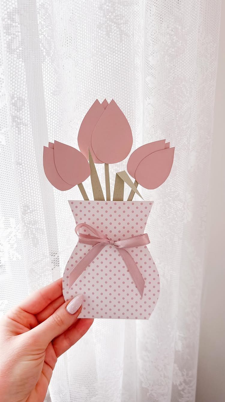 Handmade Mother's Day card shaped like a pink polka-dot vase with paper tulips.