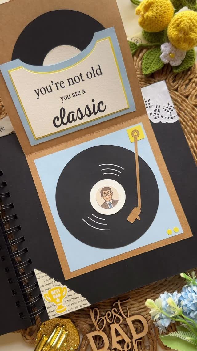 Handmade Father's Day card shaped like a vinyl record player with classic text.