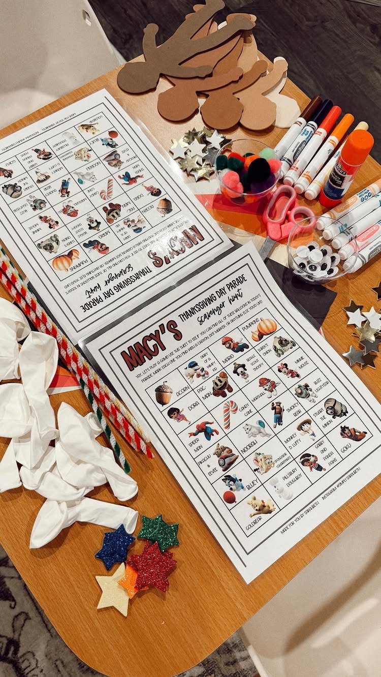 Printed Macy's Thanksgiving Day Parade scavenger hunt lists with markers and craft supplies.